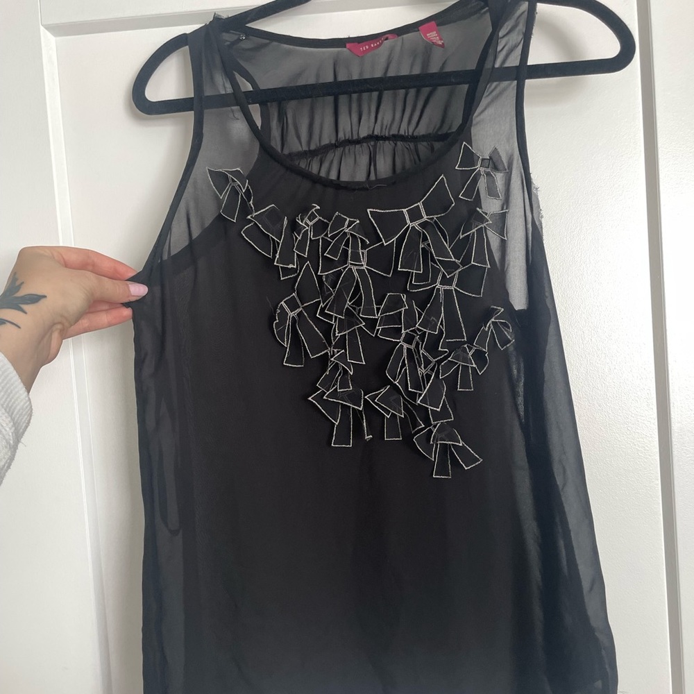Ted Baker size medium , sheer top with bows